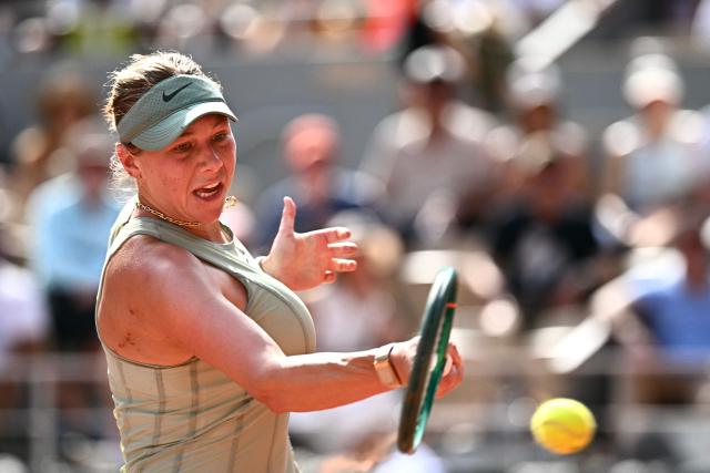 US Amanda Anisimova plays a forehand return to France's Diane Parry during their women's singles match on day 7 of the French Open tennis tournament on Court Philippe-Chatrier at the Roland-Garros Complex in Paris on May 30, 2026. (Photo by JULIEN DE ROSA / AFP)