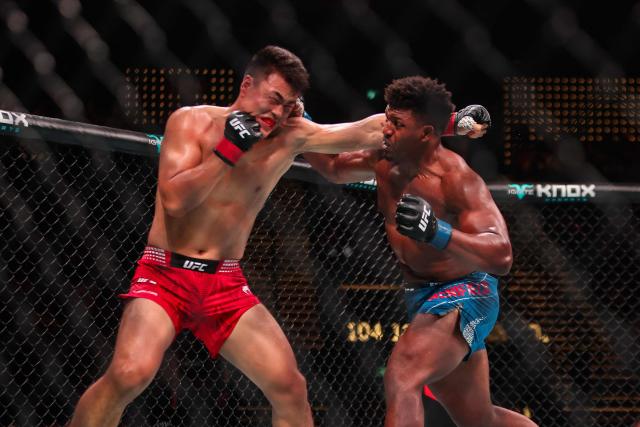 US' light heavyweight fighter Alonzo Menifield (R) punches China's Zhang Mingyang during their bout at the UFC Fight Night in Galaxy hotel resort, Macau on May 30, 2026. (Photo by Eduardo Leal / AFP)
