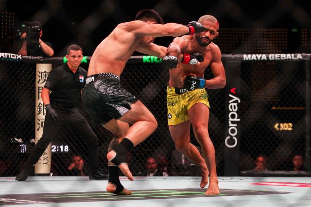 Brazil’s bantamweight fighter Deiveson Figueiredo (R) fights China’s Song Yadong during their bout at the UFC Fight Night in Galaxy hotel resort, Macau on May 30, 2026. (Photo by Eduardo Leal / AFP)