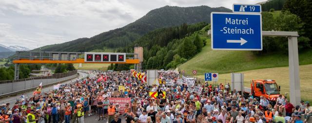 People demonstrate near the A13 Brenner Highway in the direction of Italy during the blockade of the Brenner Base Tunnel and a demonstration against transit traffic on May 30, 2026, on the Tyrolean Brenner Highway. A protest in Austria on May 30 against noise and pollution is set to close one of Europe's most important highways connecting Germany and Italy, potentially causing major traffic disruptions.
Communities in Austria's western Tyrol province have long complained about traffic, especially trucks passing over the Brenner Pass and through the province. (Photo by Joe Klamar / AFP)