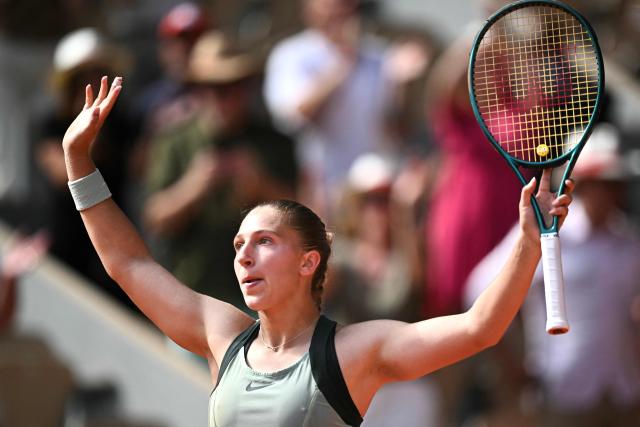 France's Diane Parry celebrates after winning against US Amanda Anisimova at the end of their women's singles match on day 7 of the French Open tennis tournament on Court Philippe-Chatrier at the Roland-Garros Complex in Paris on May 30, 2026. (Photo by JULIEN DE ROSA / AFP)
