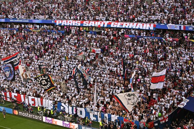 Paris Saint-German (PSG) supporters cheer for their team ahead of the UEFA Champions League final football match between Paris Saint-Germain (PSG) and Arsenal FC at the Puskas Arena in Budapest on May 30, 2026. (Photo by Attila KISBENEDEK / AFP)