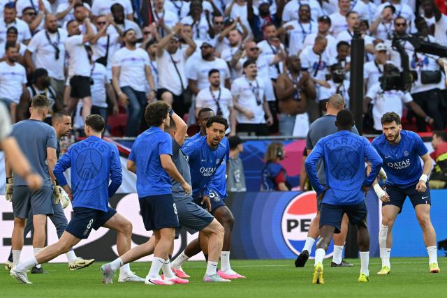Paris Saint-Germain's players warm up prior to the UEFA Champions League final football match between Paris Saint-Germain (PSG) and Arsenal FC at the Puskas Arena in Budapest on May 30, 2026. (Photo by NICOLAS TUCAT / AFP)