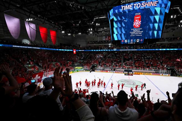 Switzerland's players react after the IIHF Ice Hockey Men's World Championship semi-final match between Switzerland and Norway at the Swiss Life Arena in Zurich, on May 30, 2026. (Photo by Fabrice COFFRINI / AFP)