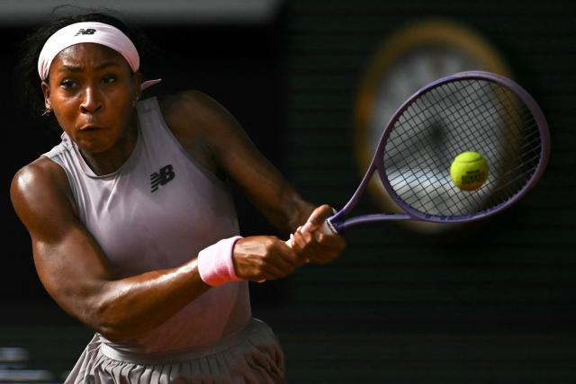 US Coco Gauff plays a backhand return to Austria's Anastasia Potapova during their women's singles match on day 7 of the French Open tennis tournament on Court Philippe-Chatrier at the Roland-Garros Complex in Paris on May 30, 2026. (Photo by JULIEN DE ROSA / AFP)