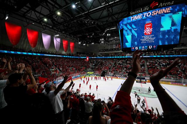 Switzerland's players react after the IIHF Ice Hockey Men's World Championship semi-final match between Switzerland and Norway at the Swiss Life Arena in Zurich, on May 30, 2026. (Photo by Fabrice COFFRINI / AFP)