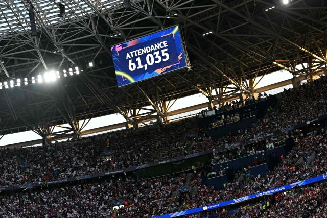 A digital display shows the number of football fans inside the stadium during the UEFA Champions League final football match between Paris Saint-Germain (PSG) and Arsenal FC at the Puskas Arena in Budapest on May 30, 2026. (Photo by NICOLAS TUCAT / AFP)