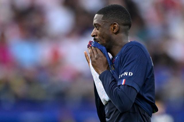 Paris Saint-Germain's French forward #10 Ousmane Dembele reacts during the UEFA Champions League final football match between Paris Saint-Germain (PSG) and Arsenal FC at the Puskas Arena in Budapest on May 30, 2026. (Photo by INA FASSBENDER / AFP)