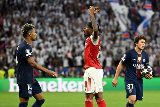 Arsenal's English midfielder #20 Noni Madueke (C) reacts next to Paris Saint-Germain's French forward #14 Desire Doue (L) and Paris Saint-Germain's Portuguese midfielder #87 Joao Neves during the UEFA Champions League final football match between Paris Saint-Germain (PSG) and Arsenal FC at the Puskas Arena in Budapest on May 30, 2026. (Photo by NICOLAS TUCAT / AFP)