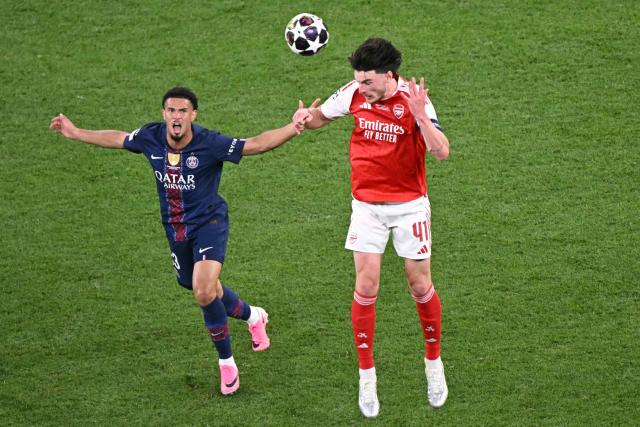 Paris Saint-Germain's French midfielder #33 Warren Zaire-Emery and Arsenal's English midfielder #41 Declan Rice fight for the ball during the UEFA Champions League final football match between Paris Saint-Germain (PSG) and Arsenal FC at the Puskas Arena in Budapest on May 30, 2026. (Photo by Attila KISBENEDEK / AFP)