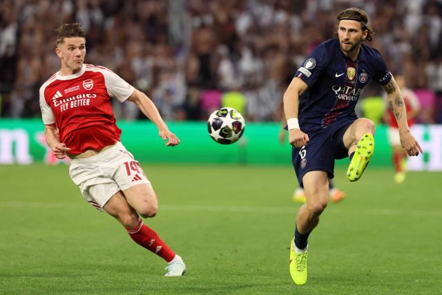 Arsenal's Swedish striker #14 Viktor Gyokeres and Paris Saint-Germain's Ukrainian defender #06 Illia Zabarnyi vie for the ball during the UEFA Champions League final football match between Paris Saint-Germain (PSG) and Arsenal FC at the Puskas Arena in Budapest on May 30, 2026. (Photo by Odd ANDERSEN / AFP)