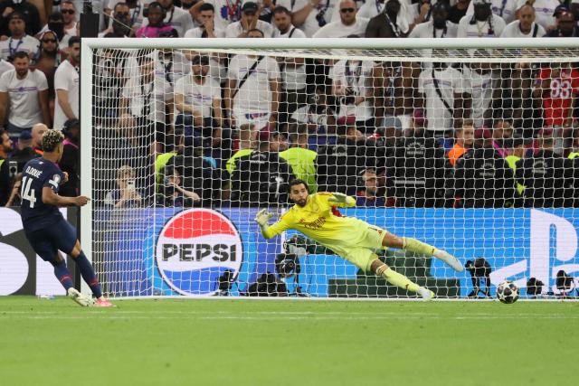 Paris Saint-Germain's French midfielder #14 Desire Doue scores the teams second penalty during the UEFA Champions League final football match between Paris Saint-Germain (PSG) and Arsenal FC at the Puskas Arena in Budapest on May 30, 2026. (Photo by Odd ANDERSEN / AFP)