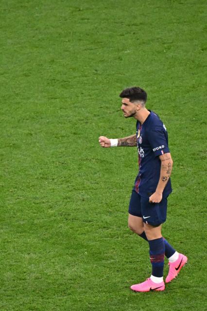 Paris Saint-Germain's Brazilian defender #04 Lucas Beraldo celebrates after scoring a penalty during the penalty shoot-out in the UEFA Champions League final football match between Paris Saint-Germain (PSG) and Arsenal FC at the Puskas Arena in Budapest on May 30, 2026. (Photo by Attila KISBENEDEK / AFP)