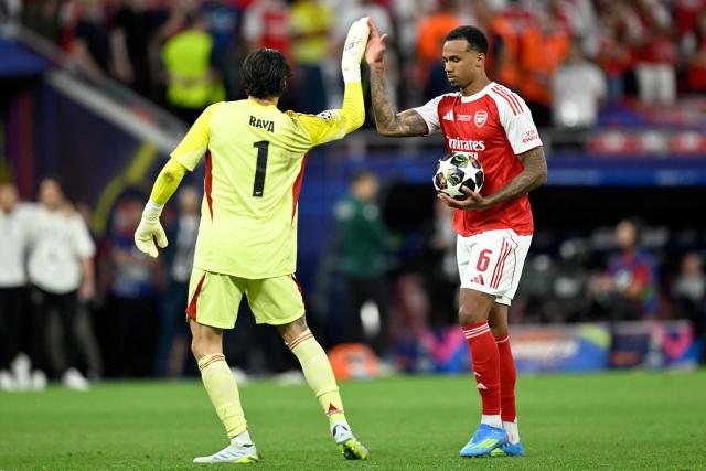 Arsenal's Spanish goalkeeper #01 David Raya (L) and Arsenal's Brazilian defender #06 Gabriel Magalhaes react before Magalhaes' turn in a penalty shootout during the UEFA Champions League final football match between Paris Saint-Germain (PSG) and Arsenal FC at the Puskas Arena in Budapest on May 30, 2026. (Photo by INA FASSBENDER / AFP)