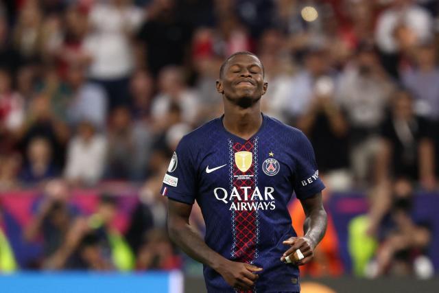 Paris Saint-Germain's Portuguese defender #25 Nuno Mendes reacts after missing a penalty during the penalty shootout during the UEFA Champions League final football match between Paris Saint-Germain (PSG) and Arsenal FC at the Puskas Arena in Budapest on May 30, 2026. (Photo by FRANCK FIFE / AFP)