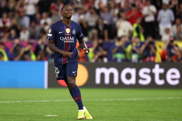 Paris Saint-Germain's Portuguese defender #25 Nuno Mendes reacts after missing a penalty during the penalty shootout during the UEFA Champions League final football match between Paris Saint-Germain (PSG) and Arsenal FC at the Puskas Arena in Budapest on May 30, 2026. (Photo by FRANCK FIFE / AFP)