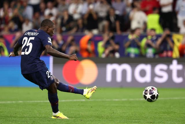 Paris Saint-Germain's Portuguese defender #25 Nuno Mendes takes a penalty during the penalty shootout during the UEFA Champions League final football match between Paris Saint-Germain (PSG) and Arsenal FC at the Puskas Arena in Budapest on May 30, 2026. lucas (Photo by FRANCK FIFE / AFP)