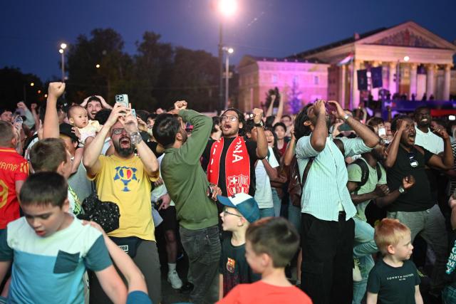 Supporters react during the penalty shoot out of the UEFA Champions League final between Paris Saint-Germain (PSG) and Arsenal FC at the public viewing in Budapest at the Heroes Square on May 30, 2026 (Photo by JURE MAKOVEC / AFP)