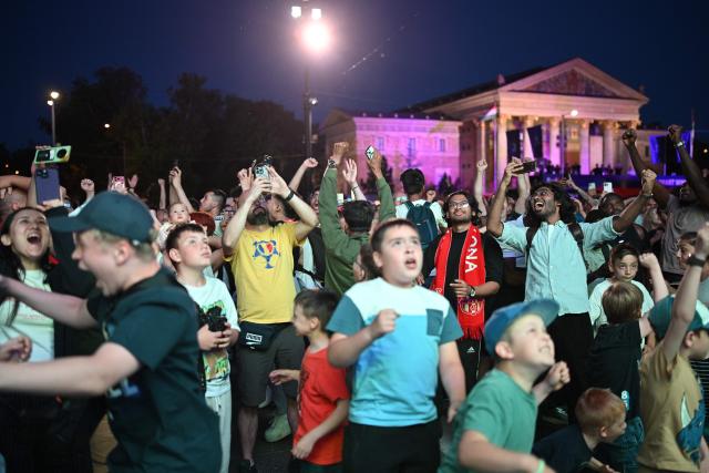 Supporters react during the penalty shoot out of the UEFA Champions League final between Paris Saint-Germain (PSG) and Arsenal FC at the public viewing in Budapest at the Heroes Square on May 30, 2026 (Photo by JURE MAKOVEC / AFP)