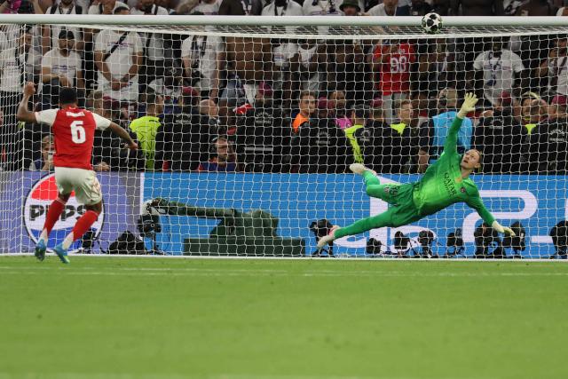 TOPSHOT - Arsenal's Brazilian defender #06 Gabriel Magalhaes shoots but fails to score the deciding penalty during the UEFA Champions League final football match between Paris Saint-Germain (PSG) and Arsenal FC at the Puskas Arena in Budapest on May 30, 2026. (Photo by Odd ANDERSEN / AFP)
