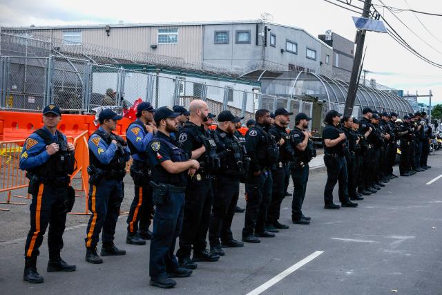 New Jersey State police officers stand guard outside Delaney Hall, which is being used as an Immigration and Customs Enforcement (ICE) detention center, in Newark, New Jersey, on May 30, 2026. New Jersey state authorities announced on May 29 they were taking charge of security outside a US immigration detention center after clashes between ICE agents and protesters angered by conditions faced by detainees inside. (Photo by Kena Betancur / AFP)