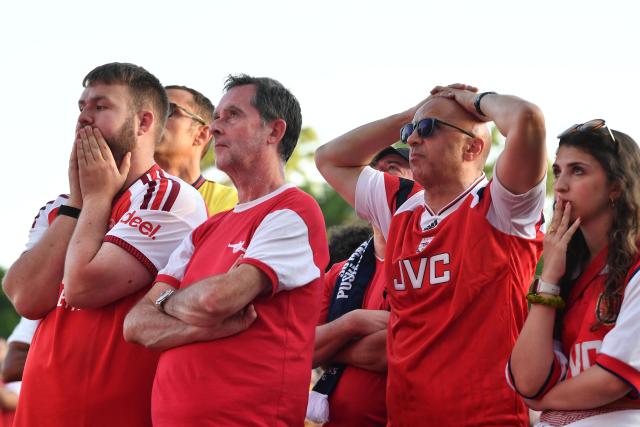 Arsenal supporters react in a fan zone during the UEFA Champions League final football match between Paris Saint-Germain (PSG) and Arsenal FC in Budapest on May 30, 2026. (Photo by Ferenc ISZA / AFP)