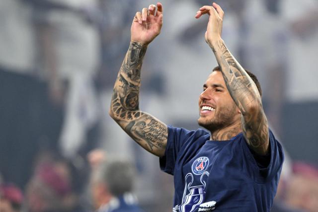 Paris Saint-Germain's French defender #21 Lucas Hernandez celebrates after winning the UEFA Champions League final football match between Paris Saint-Germain (PSG) and Arsenal FC at the Puskas Arena in Budapest on May 30, 2026. (Photo by Antonin THUILLIER / AFP)