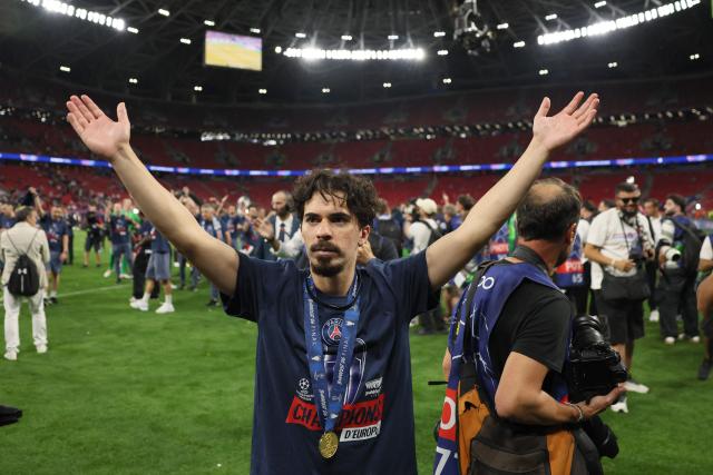 Paris Saint-Germain's Portuguese midfielder #17 Vitinha celebrates after winning the UEFA Champions League final football match between Paris Saint-Germain (PSG) and Arsenal FC at the Puskas Arena in Budapest on May 30, 2026. (Photo by Odd ANDERSEN / AFP)