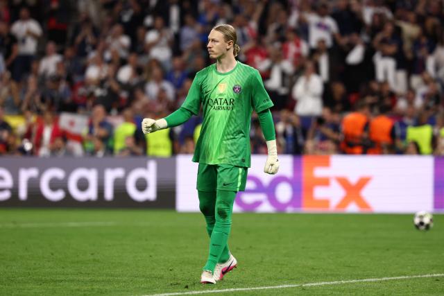 Paris Saint-Germain's Russian goalkeeper #39 Matvey Safonov reacts after Arsenal's English midfielder #10 Eberechi Eze missed his penalty of the penalty shootout during the UEFA Champions League final football match between Paris Saint-Germain (PSG) and Arsenal FC at the Puskas Arena in Budapest on May 30, 2026. (Photo by FRANCK FIFE / AFP)