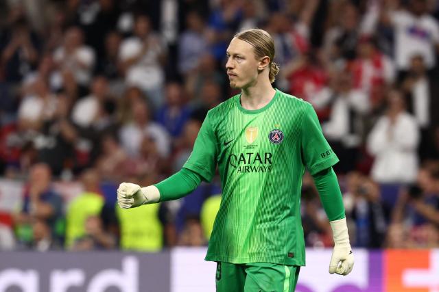 Paris Saint-Germain's Russian goalkeeper #39 Matvey Safonov reacts after Arsenal's English midfielder #10 Eberechi Eze missed his penalty of the penalty shootout during the UEFA Champions League final football match between Paris Saint-Germain (PSG) and Arsenal FC at the Puskas Arena in Budapest on May 30, 2026. (Photo by FRANCK FIFE / AFP)