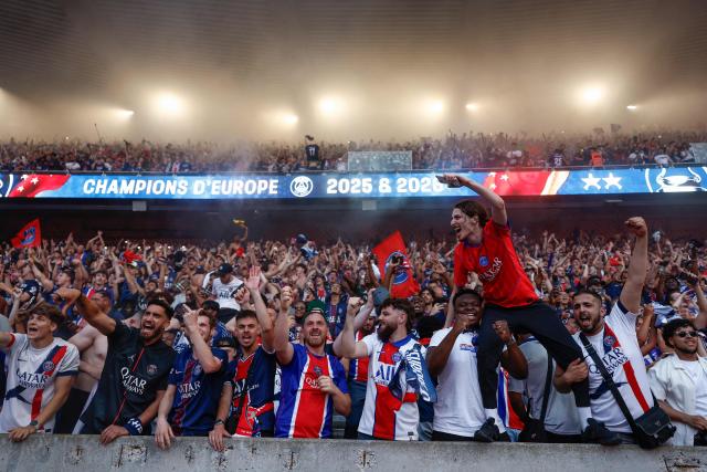 PSG supporters who watched on a giant screen the UEFA Champions League final between Paris Saint-Germain (PSG) and Arsenal FC played in Budapest, celebrate after PSG won, at the Parc des Princes stadium, in Paris on May 30, 2026. (Photo by Kenzo TRIBOUILLARD / AFP)
