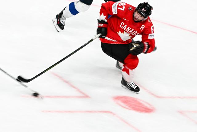 Canada’s forward #87 Sidney Crosby controls the puck during the IIHF Ice Hockey Men's World Championship semi-final match between Canada and Finland at the Swiss Life Arena in Zurich, on May 30, 2026. (Photo by Fabrice COFFRINI / AFP)