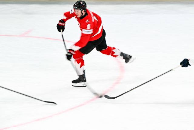 Canada’s defender #6 Sam Dickinson controls the puck during the IIHF Ice Hockey Men's World Championship semi-final match between Canada and Finland at the Swiss Life Arena in Zurich, on May 30, 2026. (Photo by Fabrice COFFRINI / AFP)