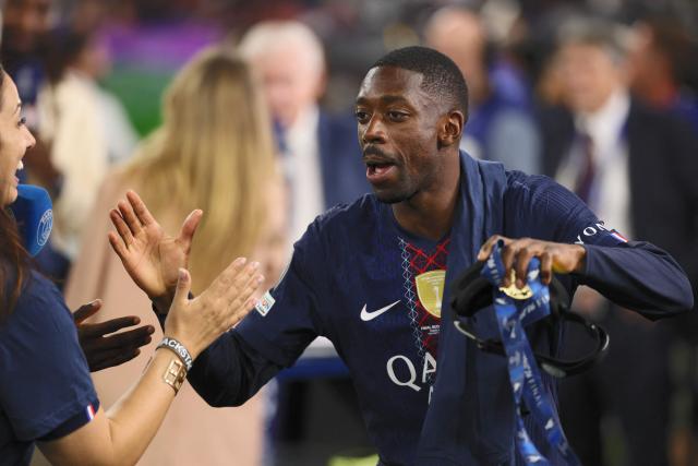 Paris Saint-Germain's French forward #10 Ousmane Dembele celebrates after winning the UEFA Champions League final football match between Paris Saint-Germain (PSG) and Arsenal FC at the Puskas Arena in Budapest on May 30, 2026. (Photo by Odd ANDERSEN / AFP)