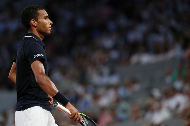 Canada's Felix Auger-Aliassime looks on as he plays against US Brandon Nakashima during their men's singles match on day 7 of the French Open tennis tournament on Court Philippe-Chatrier at the Roland-Garros Complex in Paris on May 30, 2026. (Photo by Alain JOCARD / AFP)