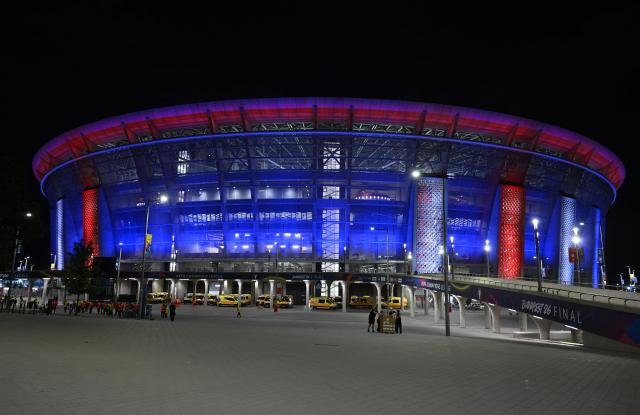 The Puskas Arena shines in the colors of PSG after Saint Germain won the UEFA Champions League final football match against Arsenal FC in Budapest on May 30, 2026. (Photo by JURE MAKOVEC / AFP)
