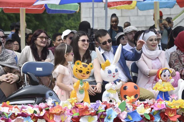 Foreign guests participate in the joint friendship gathering to mark the 76th anniversary of the International Children's Day at the Taesongsan Pleasure Park in Pyongyang on June 1, 2026. (Photo by KIM Won Jin / AFP)