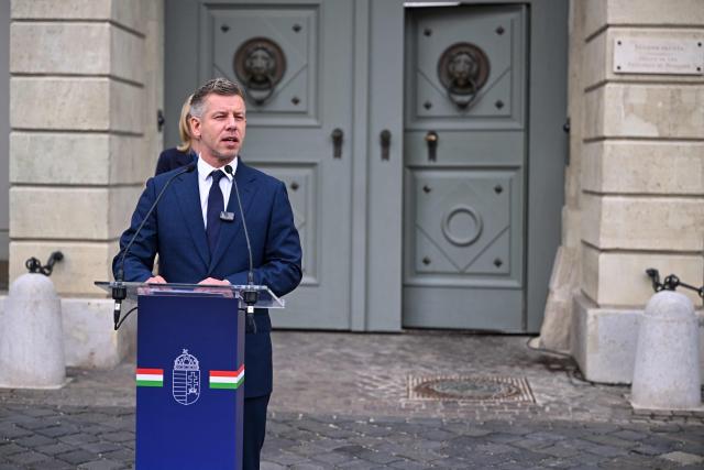 Hungary’s Prime Minister Peter Magyar gives a door-step presser after a meeting with Hungary's President at the presidential office in Sandor-palace, Budapest, Hungary, on June 1, 2026. The meeting takes place a day after a deadline set out by Magyar for the resignation of Sulyok has passed. The prime minister has urged top state officials, whom he called puppets of his predecessor, to step down by the end of May or face removal from office. (Photo by Attila KISBENEDEK / AFP)