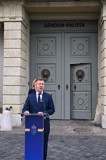 Hungary’s Prime Minister Peter Magyar gives a door-step presser after a meeting with Hungary's President at the presidential office in Sandor-palace, Budapest, Hungary, on June 1, 2026. The meeting takes place a day after a deadline set out by Magyar for the resignation of Sulyok has passed. The prime minister has urged top state officials, whom he called puppets of his predecessor, to step down by the end of May or face removal from office. (Photo by Attila KISBENEDEK / AFP)