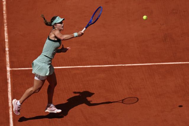 Anna Kalinskaya plays a forehand return to Austria's Anastasia Potapova during their women's singles match on day 9 of the French Open tennis tournament on Court Suzanne-Lenglen at the Roland-Garros Complex in Paris on June 1, 2026. (Photo by Anne-Christine POUJOULAT / AFP)