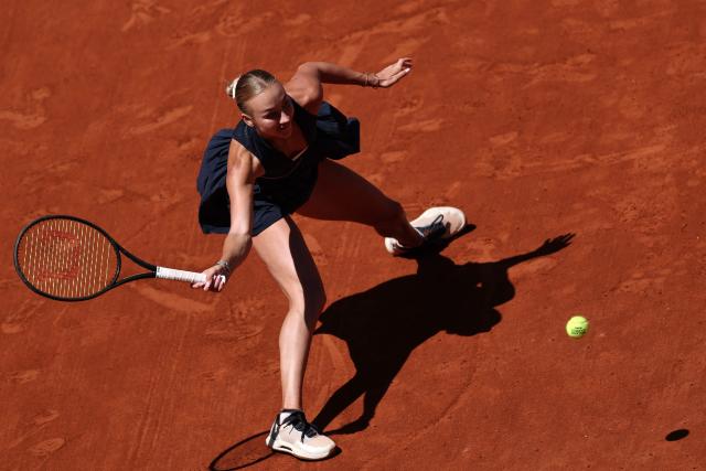 Austria's Anastasia Potapova plays a forehand return to Anna Kalinskaya during their women's singles match on day 9 of the French Open tennis tournament on Court Suzanne-Lenglen at the Roland-Garros Complex in Paris on June 1, 2026. (Photo by Anne-Christine POUJOULAT / AFP)