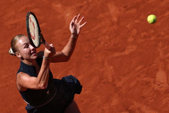 Austria's Anastasia Potapova plays a forehand return to Anna Kalinskaya during their women's singles match on day 9 of the French Open tennis tournament on Court Suzanne-Lenglen at the Roland-Garros Complex in Paris on June 1, 2026. (Photo by Anne-Christine POUJOULAT / AFP)