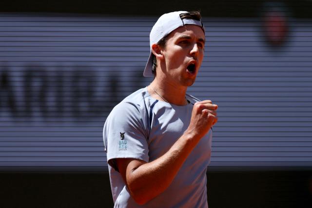 US Zachary Svajda reacts after a point as he plays against Italy's Flavio Cobolli during their men's singles match on day 9 of the French Open tennis tournament on Court Philippe-Chatrier at the Roland-Garros Complex in Paris on June 1, 2026. (Photo by ALAIN JOCARD / AFP)
