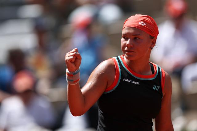 Diana Shnaider reacts to a point against US Madison Keys during their women's singles match on day 9 of the French Open tennis tournament on Court Suzanne-Lenglen at the Roland-Garros Complex in Paris on June 1, 2026. (Photo by Anne-Christine POUJOULAT / AFP)