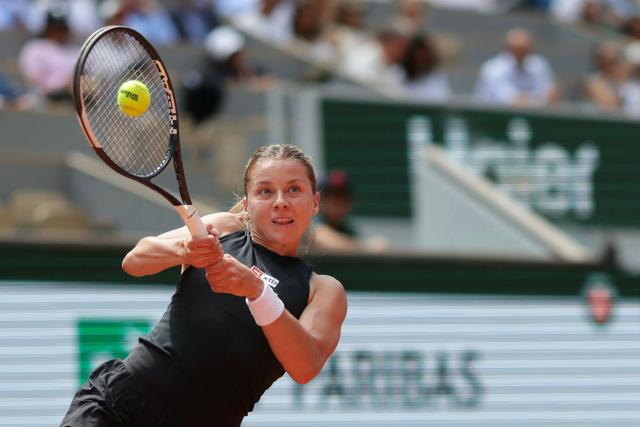 Poland's Maja Chwalinska plays a backhand return to France's Diane Parry during their women's singles match on day 9 of the French Open tennis tournament on Court Philippe-Chatrier at the Roland-Garros Complex in Paris on June 1, 2026. (Photo by Thomas SAMSON / AFP)