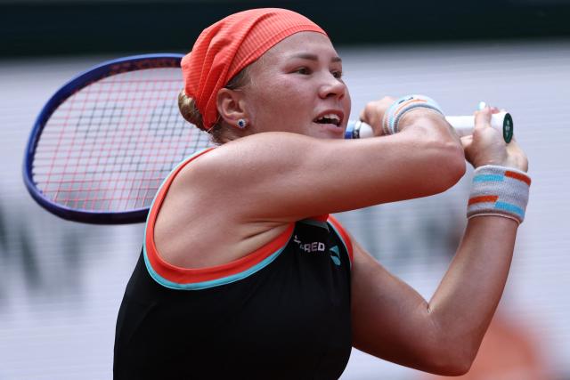 Diana Shnaider eyes the ball after playing a backhand return to US Madison Keys during their women's singles match on day 9 of the French Open tennis tournament on Court Suzanne-Lenglen at the Roland-Garros Complex in Paris on June 1, 2026. (Photo by Anne-Christine POUJOULAT / AFP)