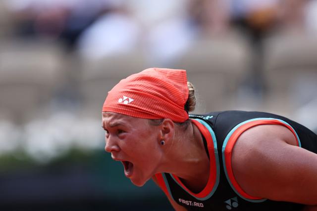 Diana Shnaider reacts to a point against US Madison Keys during their women's singles match on day 9 of the French Open tennis tournament on Court Suzanne-Lenglen at the Roland-Garros Complex in Paris on June 1, 2026. (Photo by Anne-Christine POUJOULAT / AFP)