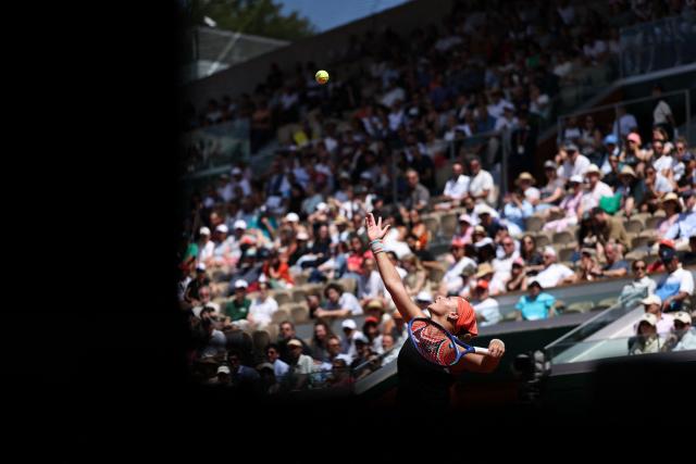 Diana Shnaider serves to US Madison Keys during their women's singles match on day 9 of the French Open tennis tournament on Court Suzanne-Lenglen at the Roland-Garros Complex in Paris on June 1, 2026. (Photo by Anne-Christine POUJOULAT / AFP)