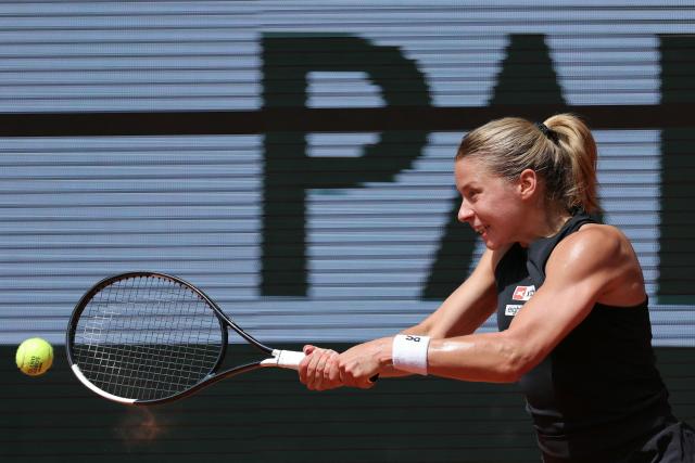 Poland's Maja Chwalinska plays a backhand return to France's Diane Parry during their women's singles match on day 9 of the French Open tennis tournament on Court Philippe-Chatrier at the Roland-Garros Complex in Paris on June 1, 2026. (Photo by Thomas SAMSON / AFP)
