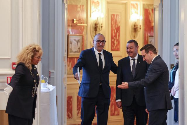 Algeria's Interior and Transport Minister Said Sayoud (2nd R) and  France's Interior Minister Laurent Nunez (2nd L) arrive for a meeting at the French Interior Ministry in Paris on June 1, 2026. France's Interior minister hists his ALgerian counterpart for a ‘working visit’, which could mark a new stage in the thawing of relations between Algeria and France. (Photo by Kenzo TRIBOUILLARD / POOL / AFP)
